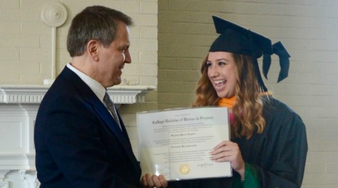 Meghan Hughes receiving her diploma from Prof. Deschenes